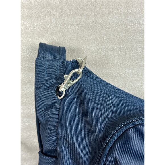 Travel on antitheft classic Crossbody bucket bag navy blue new without tags 
￼ - Picture 2 of 10